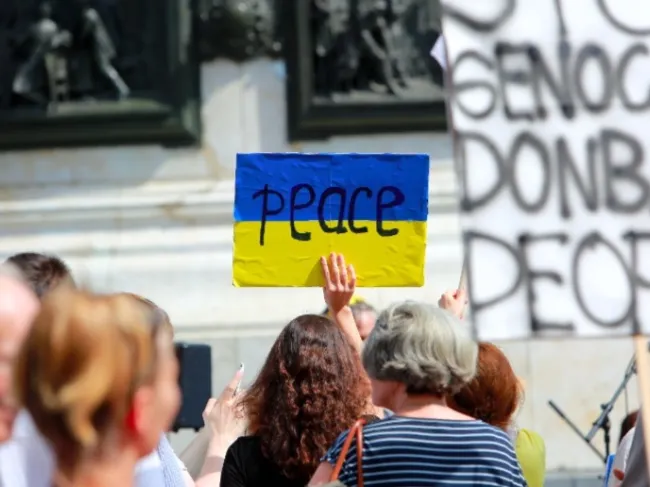 Woman holding peace sign